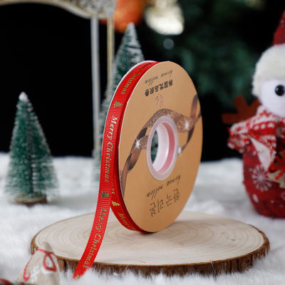 1cm*45m Hediye ambalajı ve giyim aksesuarları için Noel basılı kurdele