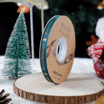 1cm*45m Hediye ambalajı ve giyim aksesuarları için Noel basılı kurdele
